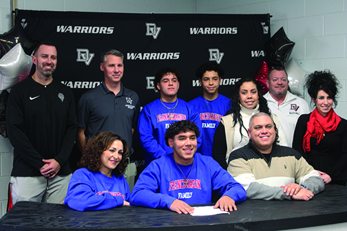 Senior athlete Isaiah Berrios attended the first-ever signing day held in the Media Center on Feb. 5. Isaiah, along with 10 others, committed to play collegiate sports.