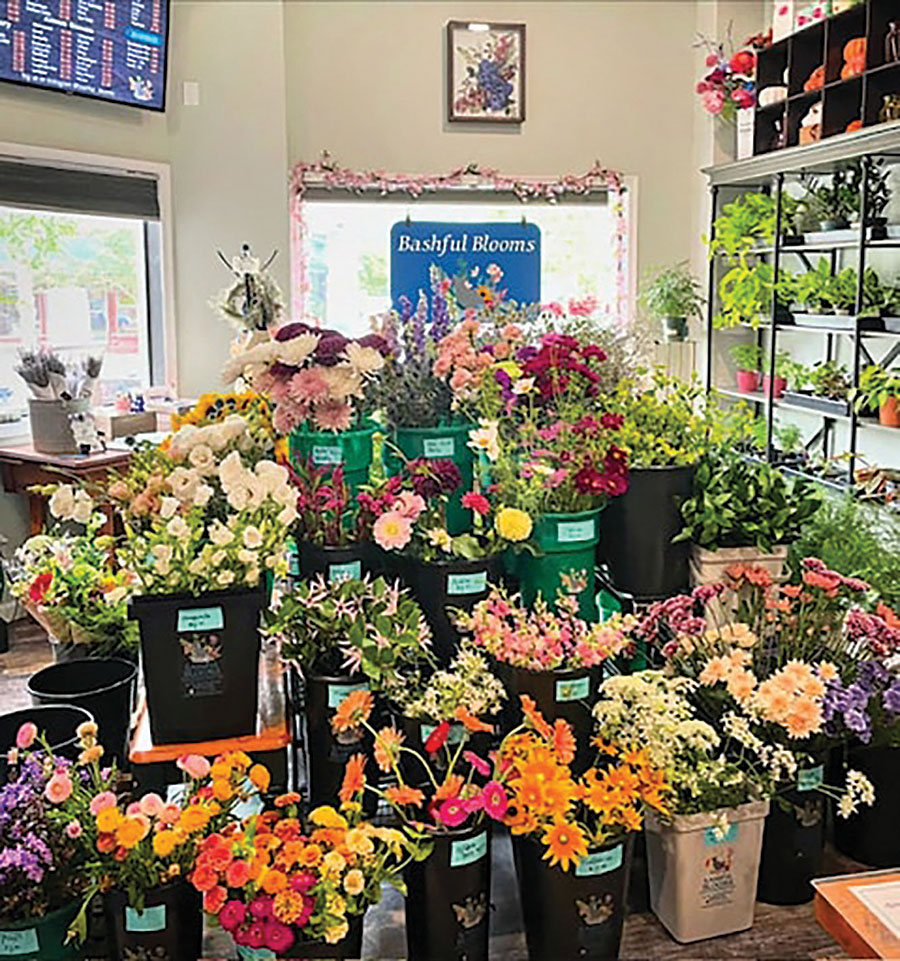 From the moment customers walk in, they are greeted with a colorful display of flowers.